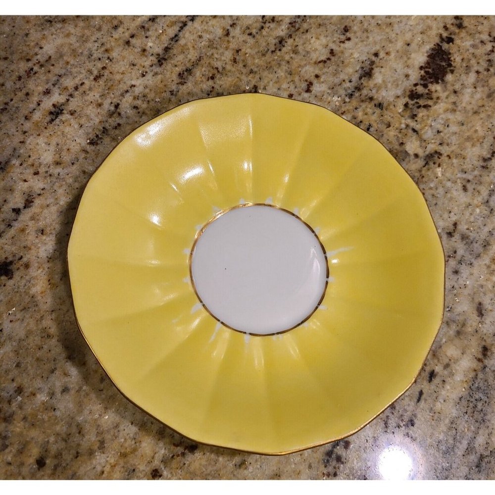 Limoges TV Orvington's New York. Yellow 5.5" Tea  Saucer
